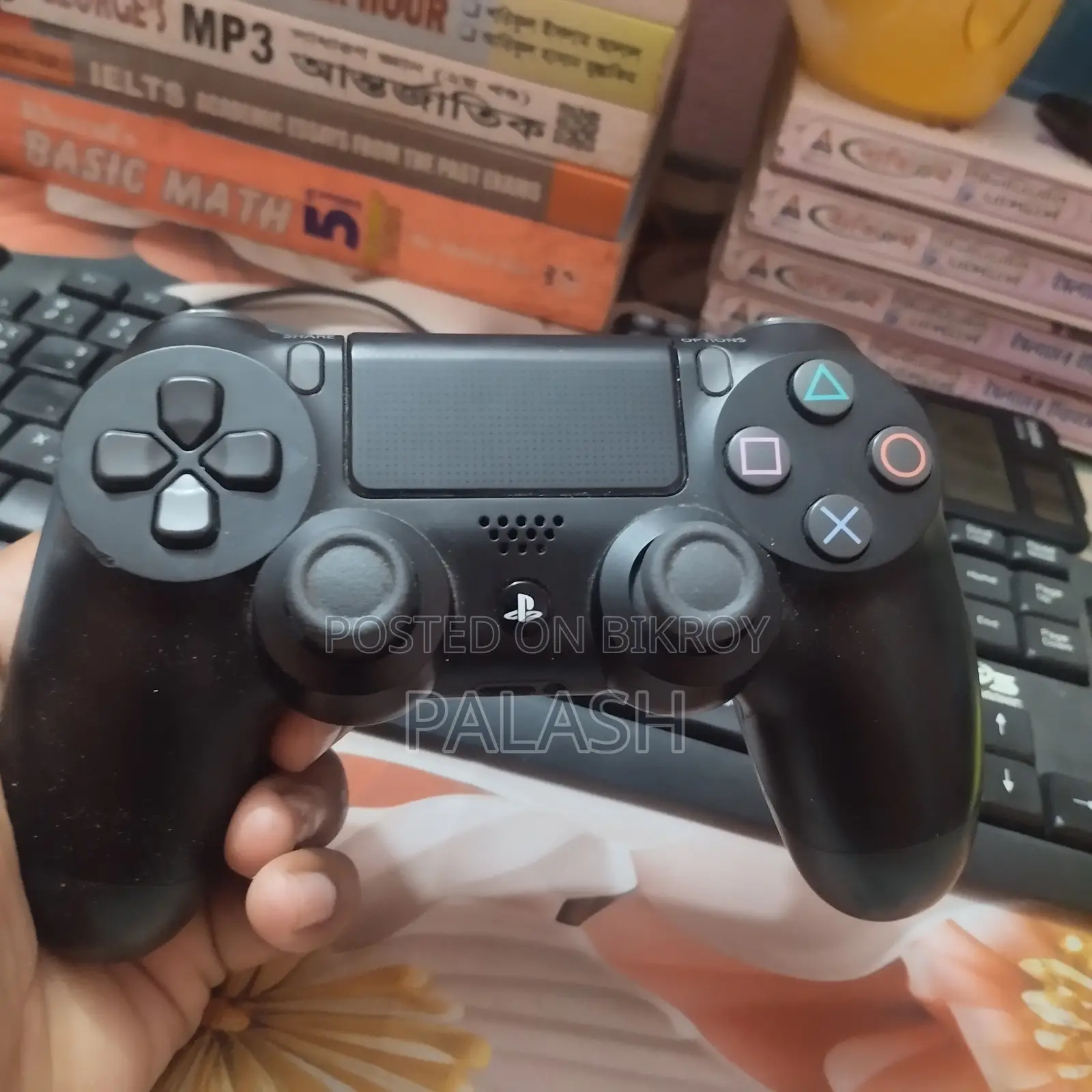 PS4, দুটি কন্ট্রোলার, ৪টি গেম