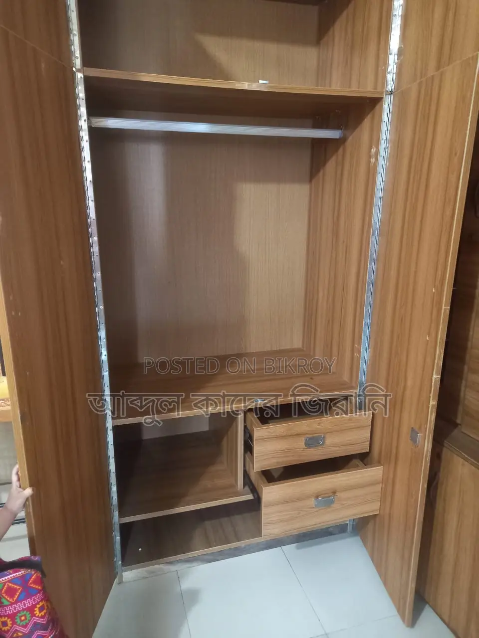A wooden wardrobe is for sale