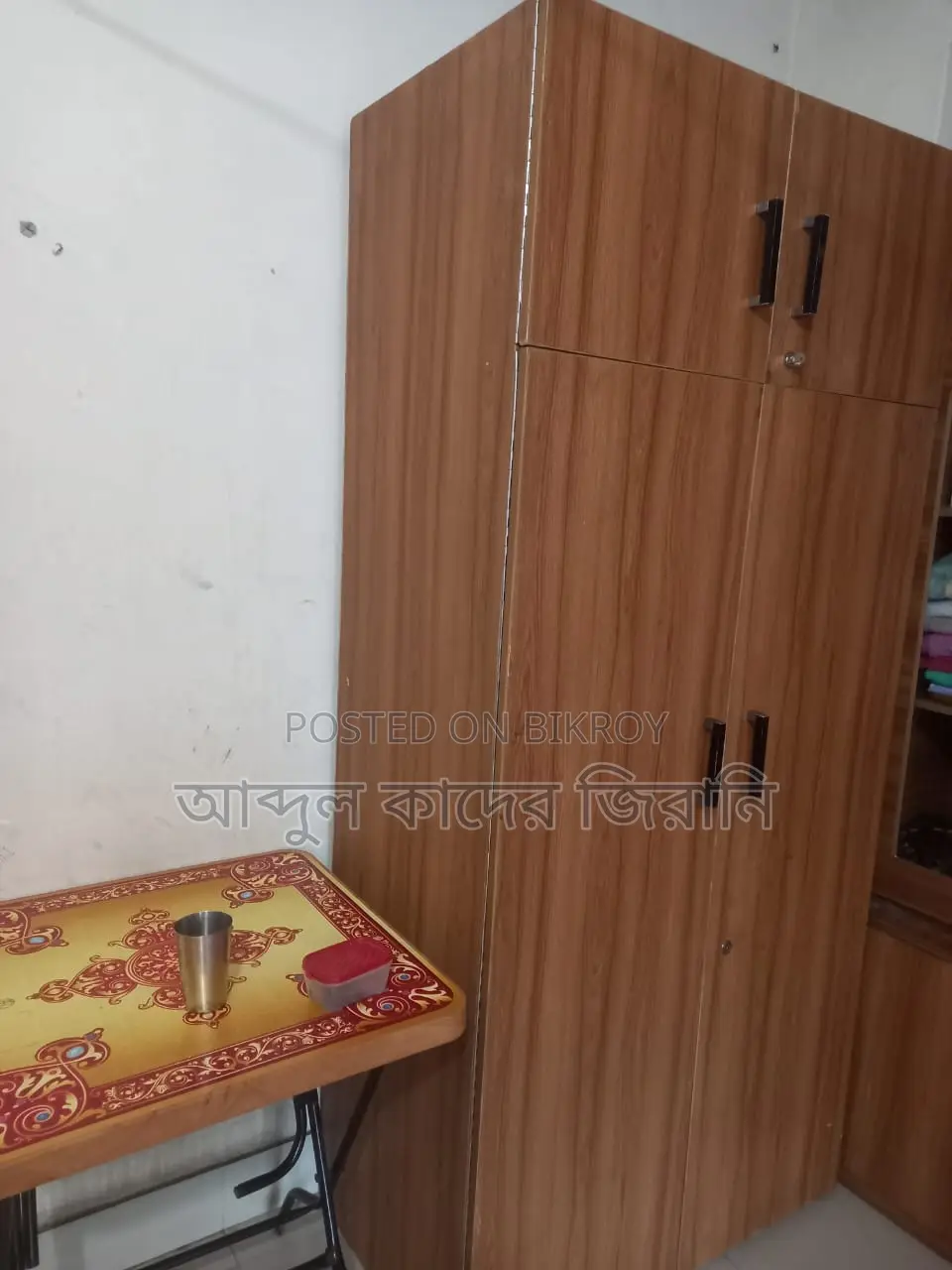 A wooden wardrobe is for sale