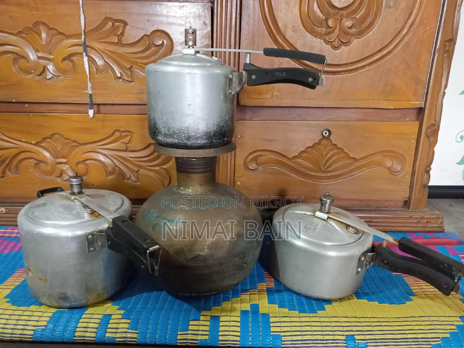 1 Brass Pitcher, Three Pressure Cookers for Sale.