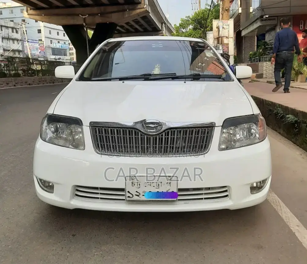 টয়োটা করোল্লা সেডান ২০০৪ সাদা