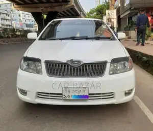টয়োটা করোল্লা সেডান ২০০৪ সাদা
