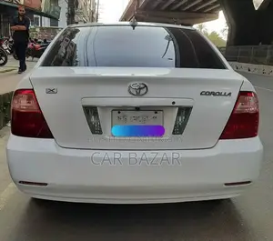 টয়োটা করোল্লা সেডান ২০০৪ সাদা