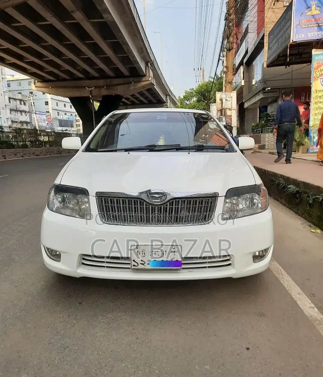 টয়োটা করোল্লা সেডান ২০০৪ সাদা