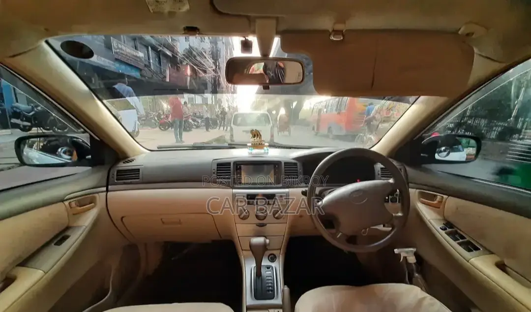 টয়োটা করোল্লা সেডান ২০০৪ সাদা