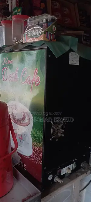 Coffee machine for sale due to urgent need for money. Makes tea, milk, and hot water.
