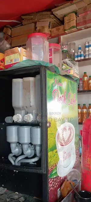 Coffee machine for sale due to urgent need for money. Makes tea, milk, and hot water.