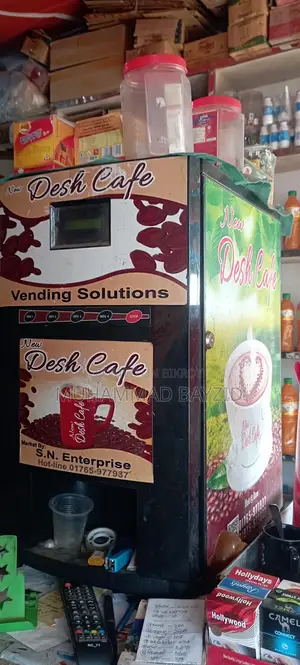 Coffee machine for sale due to urgent need for money. Makes tea, milk, and hot water.