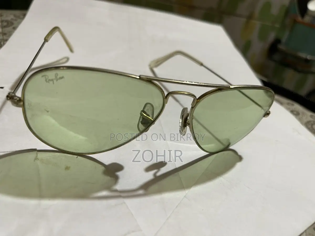 Vintage Ray Ban BL Photochromic Sunglasses 58 14 green lenses.