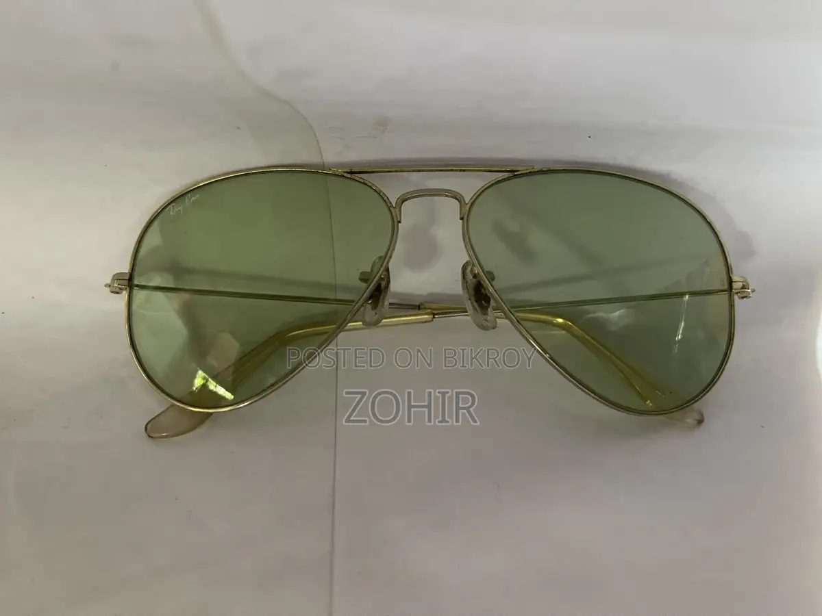Vintage Ray Ban BL Photochromic Sunglasses 58 14 green lenses.