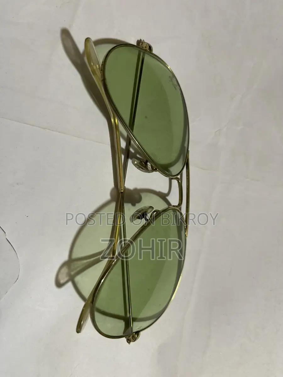 Vintage Ray Ban BL Photochromic Sunglasses 58 14 green lenses.