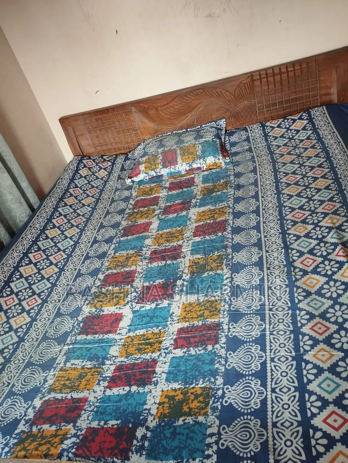 আকাশ্মনি কাঠের খাট