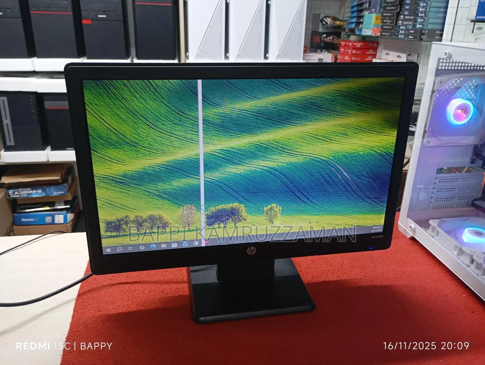 HP 19" Monitor. Has a thread-like line.