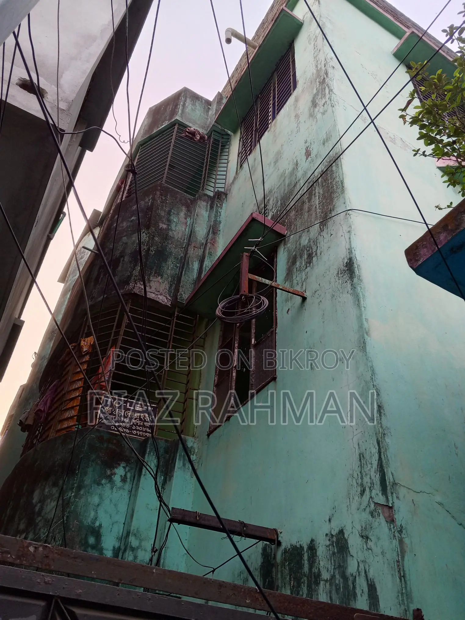 Three-story building for sale.
