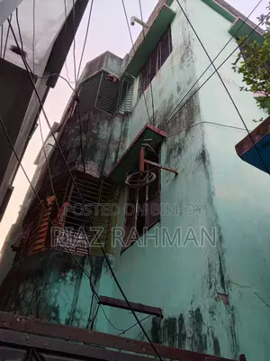 Three-story building for sale.