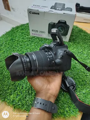 canon 200D with 18-55 STM lens full fresh box condition...