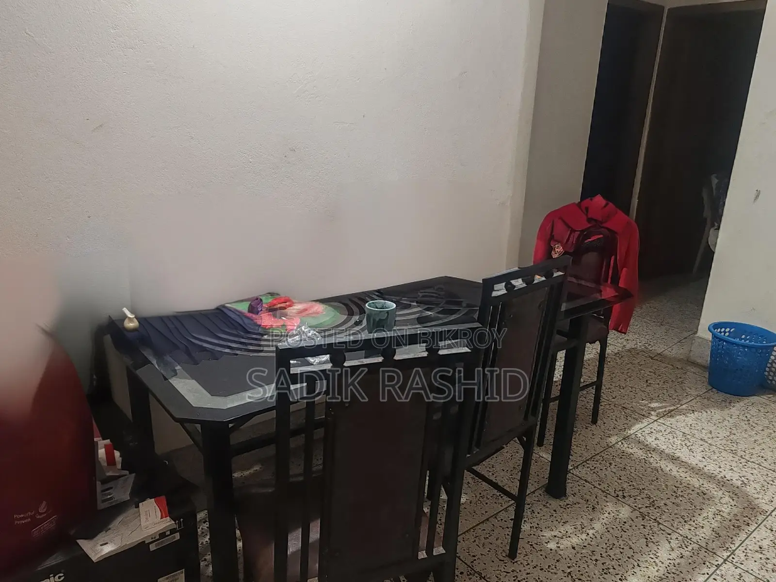 This steel (m/s) dining table with 4 chairs is for sale.