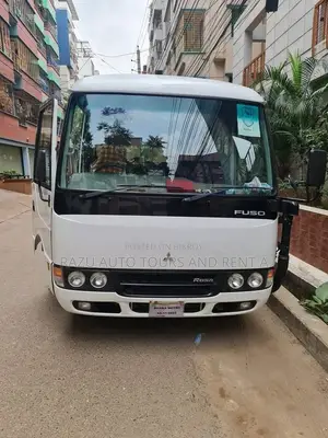 Nissan Coster Bus For Rent