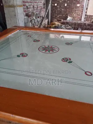 A Glass Carrom Board