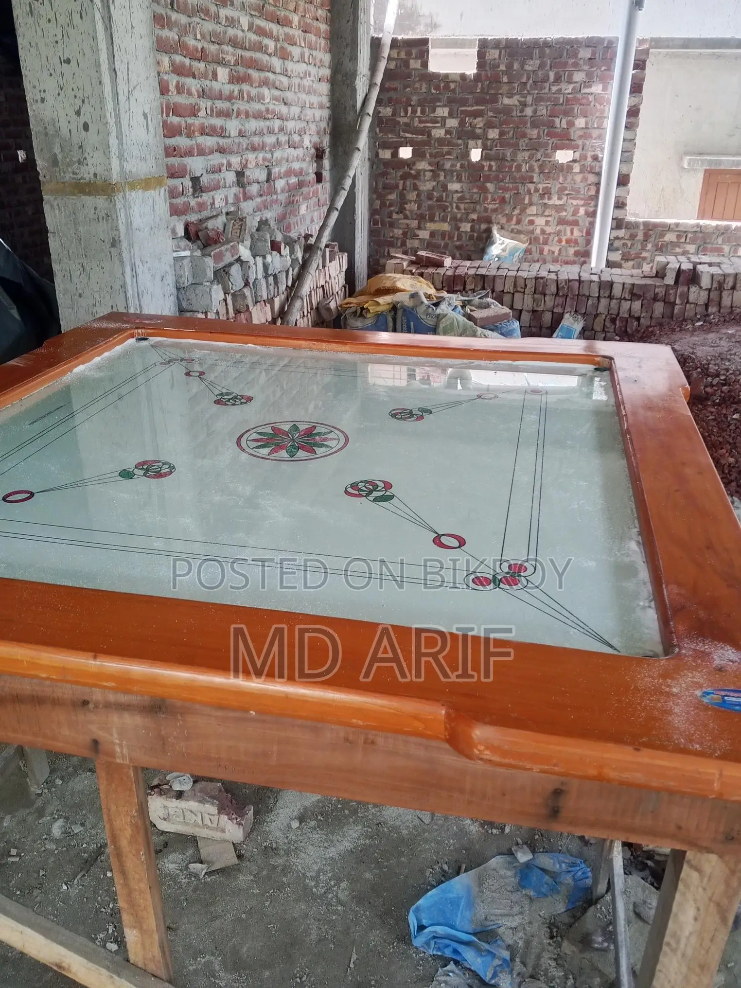 A Glass Carrom Board