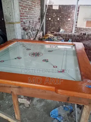 A Glass Carrom Board
