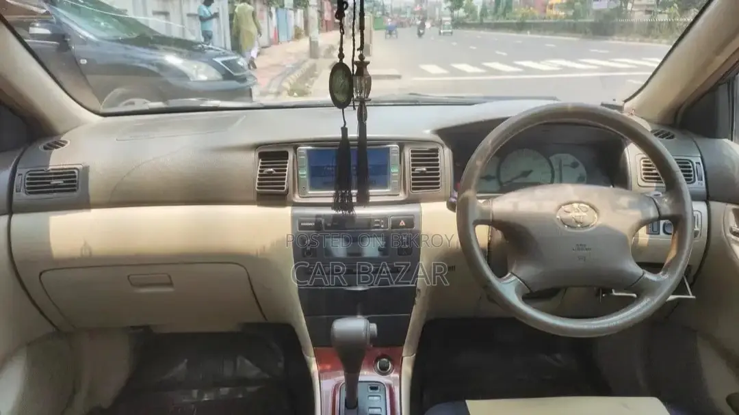 টয়োটা করোলা জি বেইজ এনজেডই১২১ ২০০২