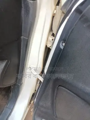 Toyota Corolla white 2003