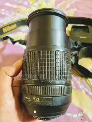 Nikon D3200 with 18-140 master zoom lens