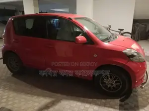 Toyota Passo red 2008