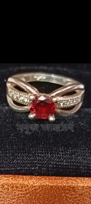 Brand new 21K hallmark ruby ring from the US