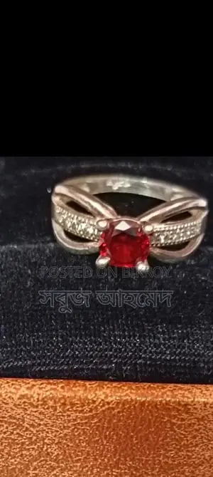 Brand new 21K hallmark ruby ring from the US