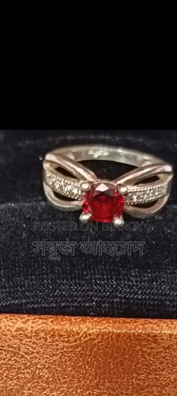 Brand new 21K hallmark ruby ring from the US
