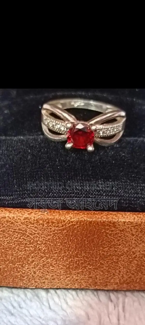 Brand new 21K hallmark ruby ring from the US