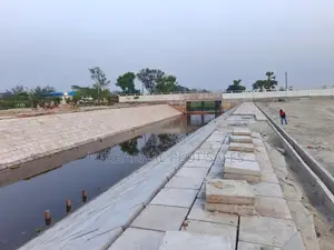 Buy a plot at Pine City after seeing visible development.