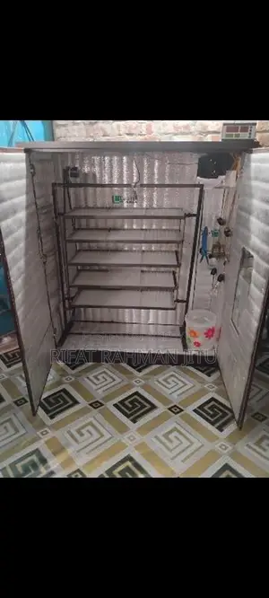 ইনকিউবেটর মেশিন