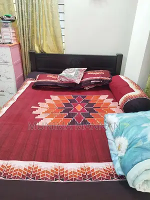 Almirah, Dressing Table, and Bed