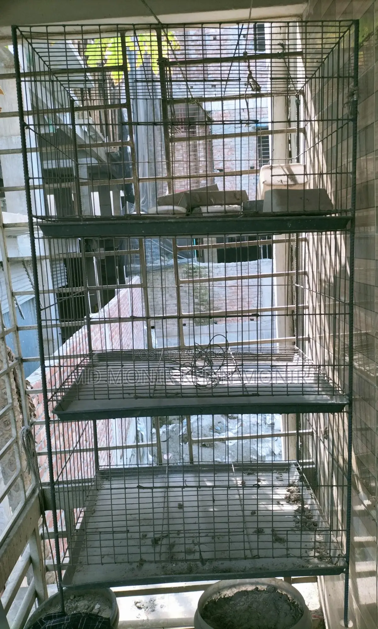 Bird Cages for Sale: One four-compartment and two three-compartment cages with food bowls