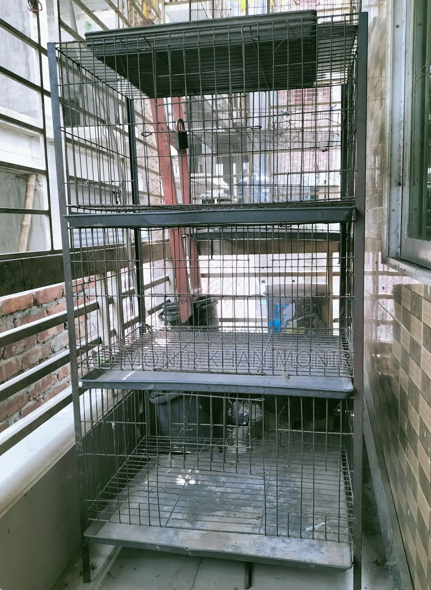 Bird Cages for Sale: One four-compartment and two three-compartment cages with food bowls