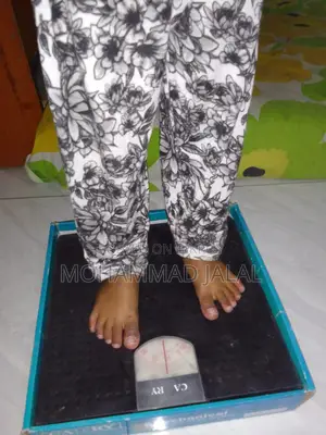 শারীরিয় ওজন মাপার মেশিন