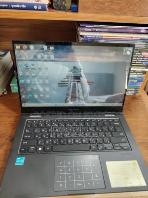 💻 ASUS VivoBook Go 14 Flip (Touch + 360° Convertible)