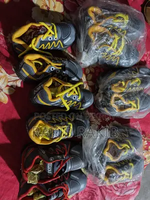 Shoes for kids and adults, only 50 Taka per pair.