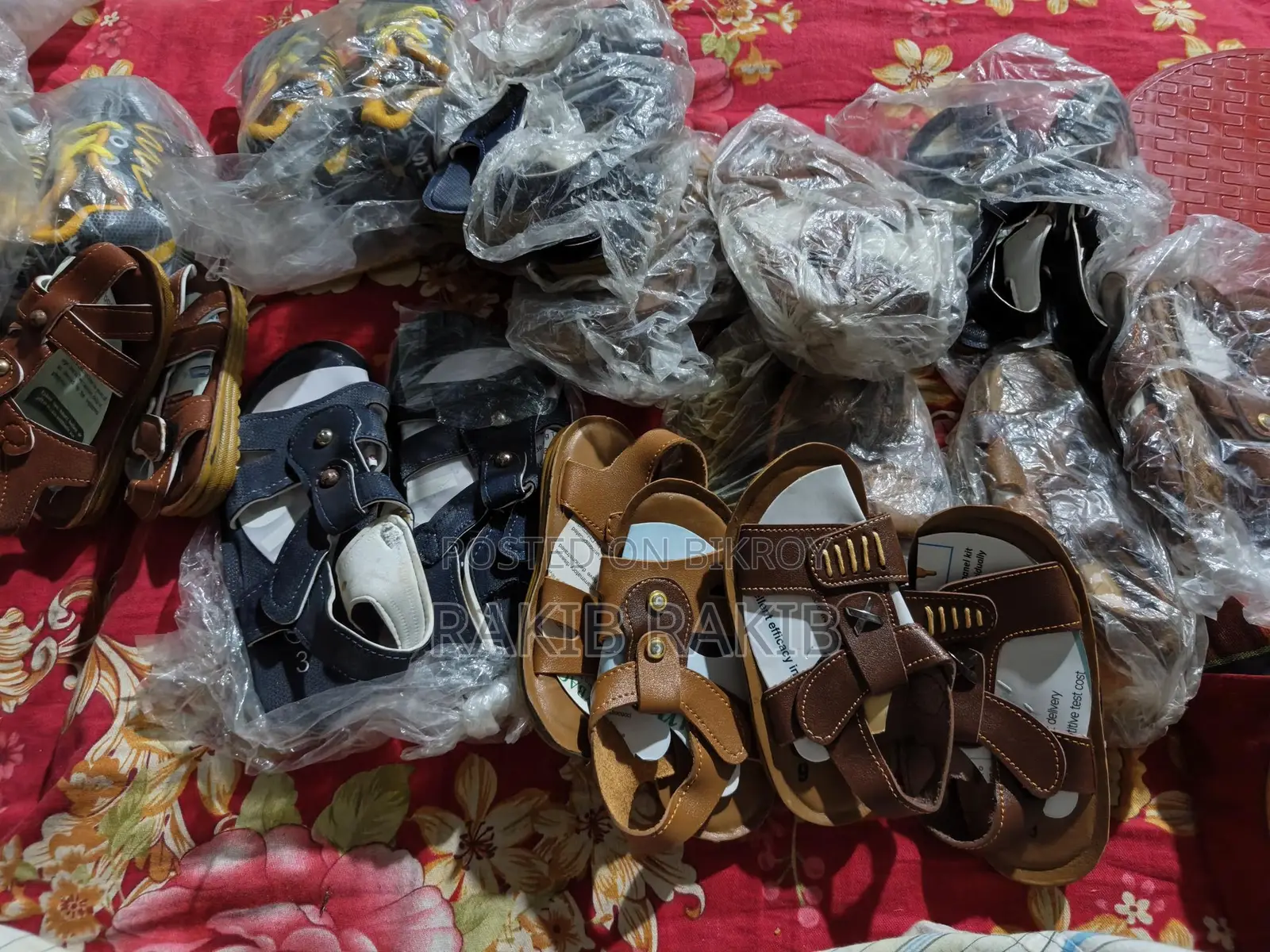 Shoes for kids and adults, only 50 Taka per pair.