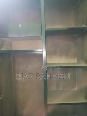 Malaysian Oak Wood Wardrobe. In almost new condition.