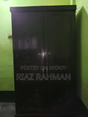 Malaysian Oak Wood Wardrobe. In almost new condition.