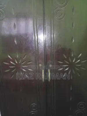 Malaysian Oak Wood Wardrobe. In almost new condition.