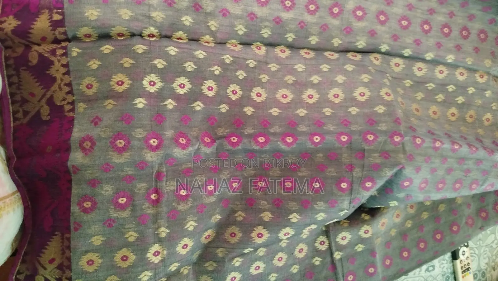 Two sarees for sale, one used and one new