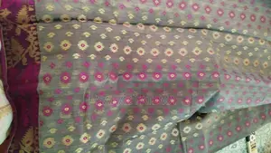 Two sarees for sale, one used and one new