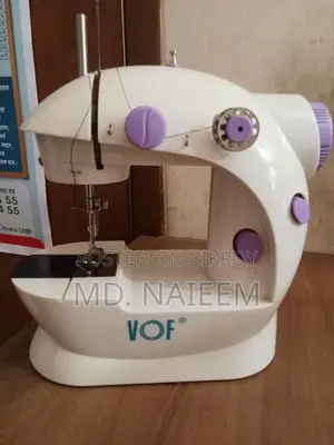 মিনি ইলেকট্রিক সেলাই মেশিন