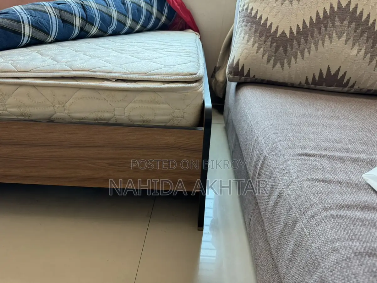 Single bed with mattress and topper