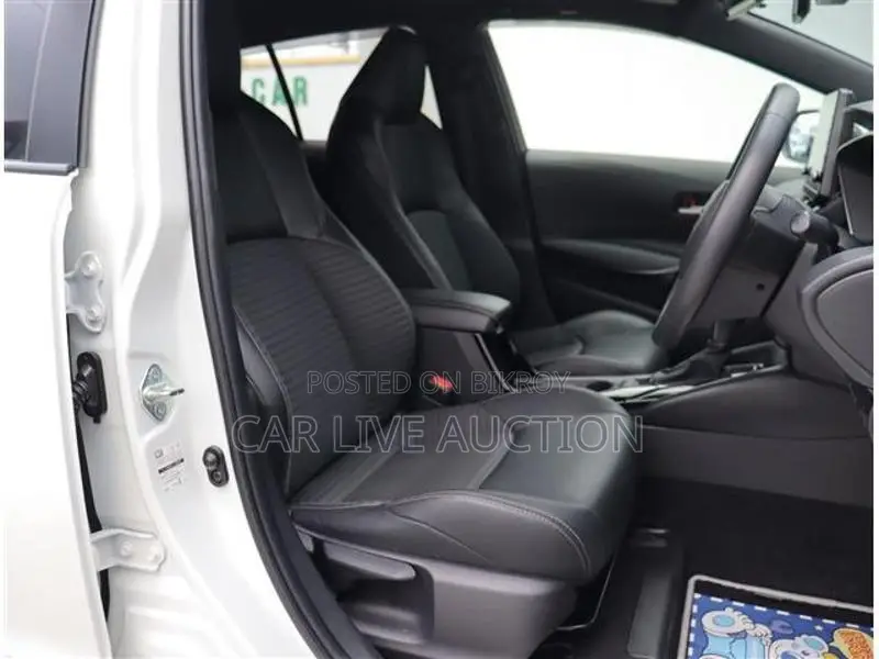 Toyota Corolla Hybrid WXB TOURING 2021